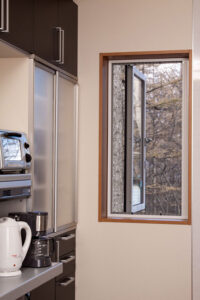 Vista One - Foldaway Series on a kitchen window.