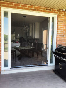 Vista One - Foldaway Series on Double back door to patio with bbq.