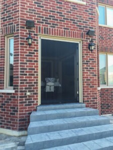 Vista One - Foldaway Series on Double back door to steps to backyard.