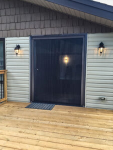 Vista One - Foldaway Series on double french doors to large deck.