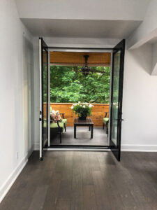 Vista One - Rollaway Series on double french doors to cover porch area.