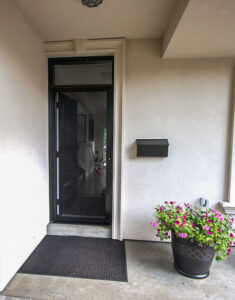 Vista One - Rollaway Screen single front door of townhome.