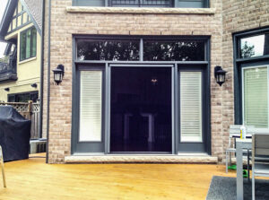 Vista One - Foldaway Screen large double door opening to the backyard large deck.